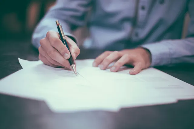 A business agreement being reviewed